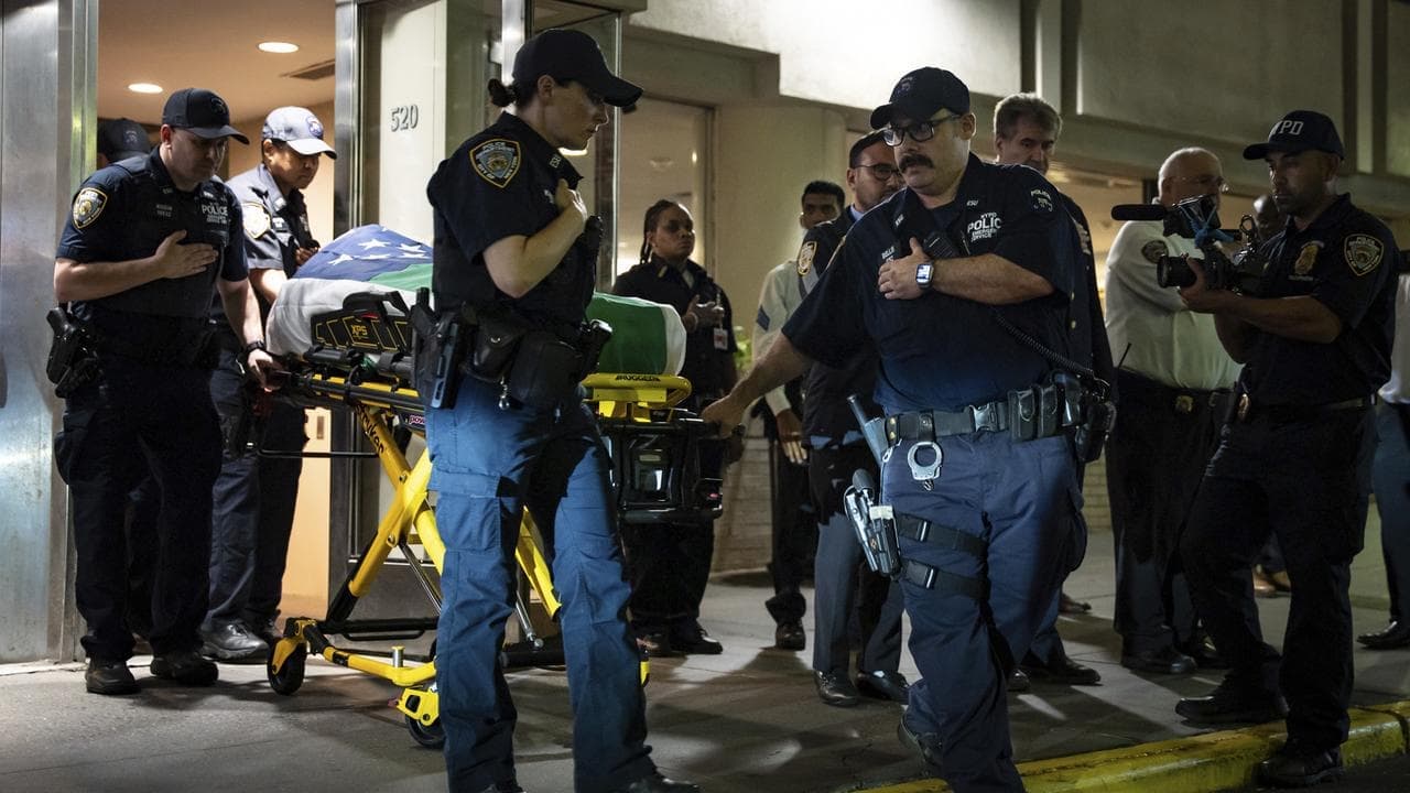 Police hunt motive for mass shooting in New York tower