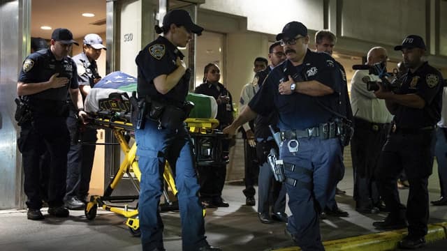 Police hunt motive for mass shooting in New York tower