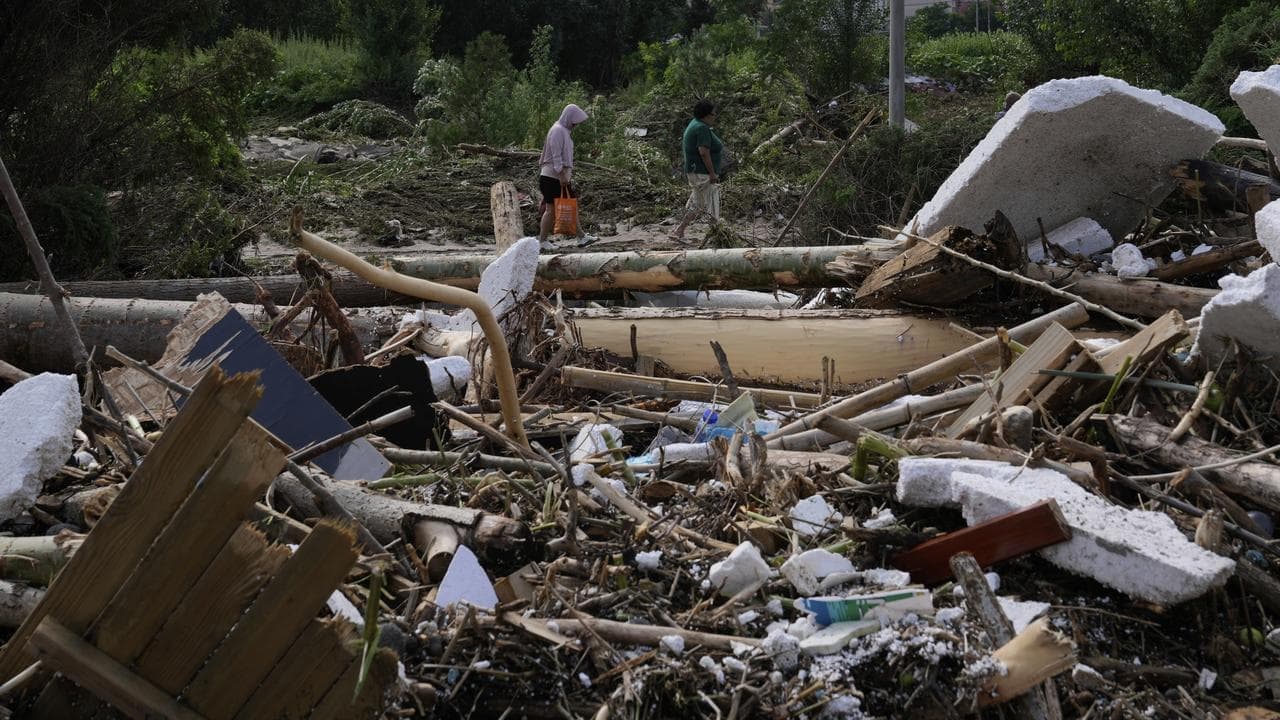 At least 30 dead as rain turns Beijing into rain trap