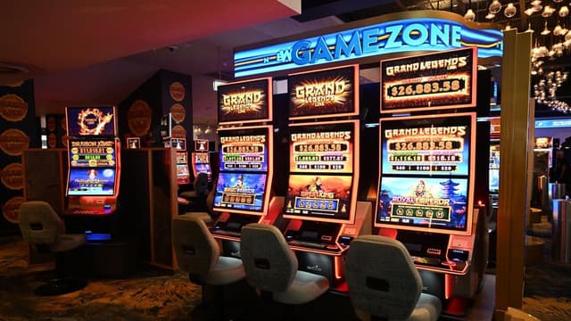 Pokies giant taken to court over money laundering gaps