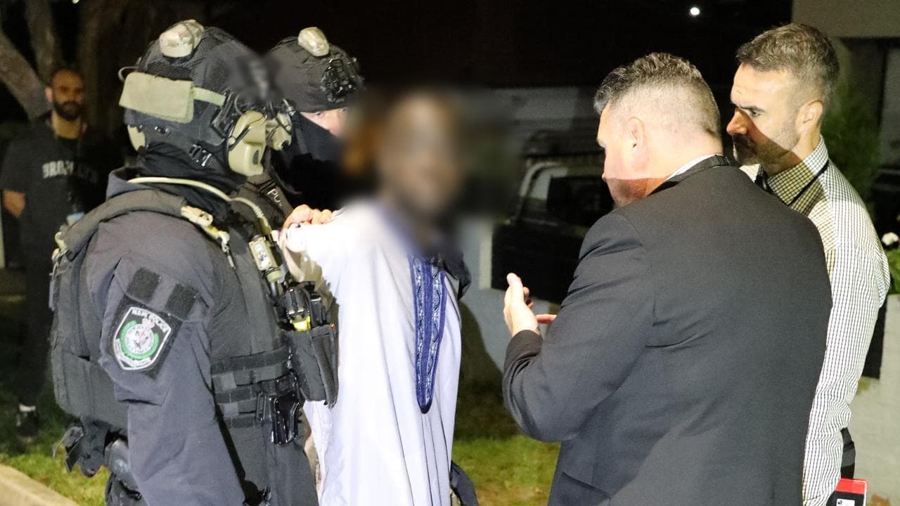 Laughs, dancing as men deny roles in underworld hit