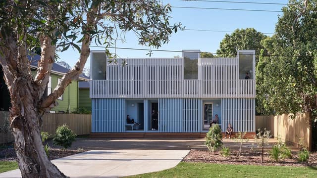 Prefab house ferried to island by night wins top award