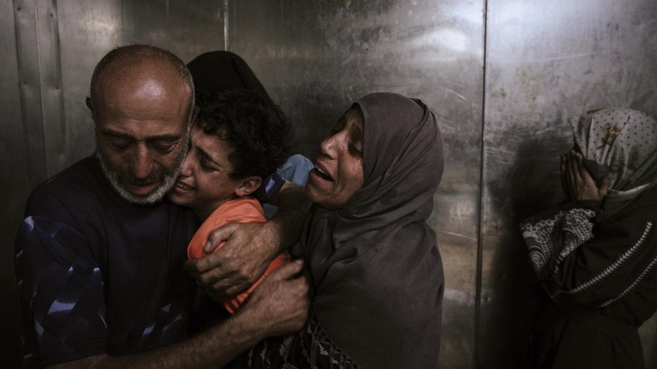 Dozens killed in Gaza as Israel weighs military action