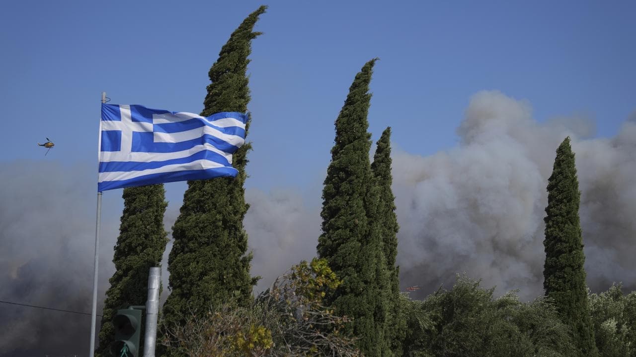 Greece wildfire contained as winds prompt evacuations