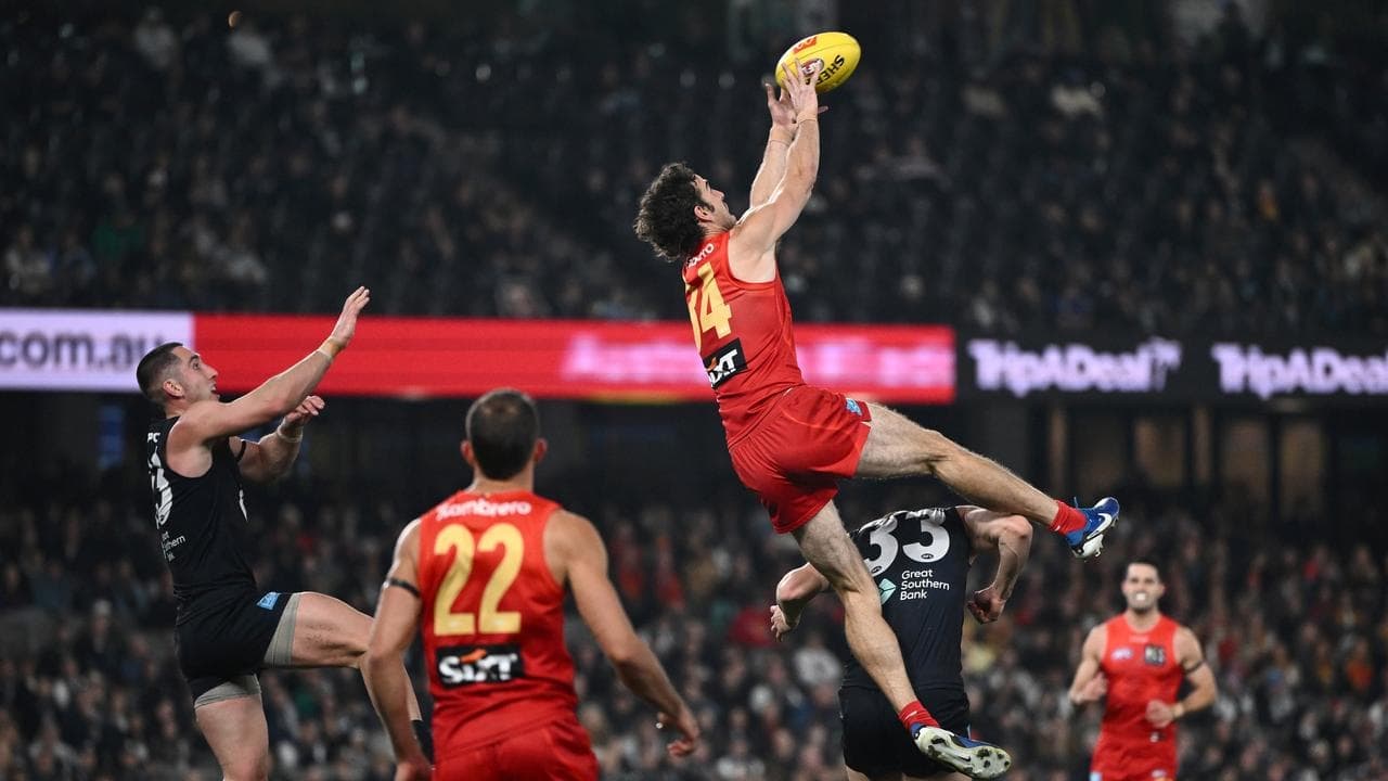 King flies high as Suns hang on against surging Blues