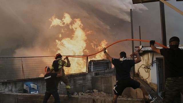 Heatwave, strong winds fan wildfires across Europe