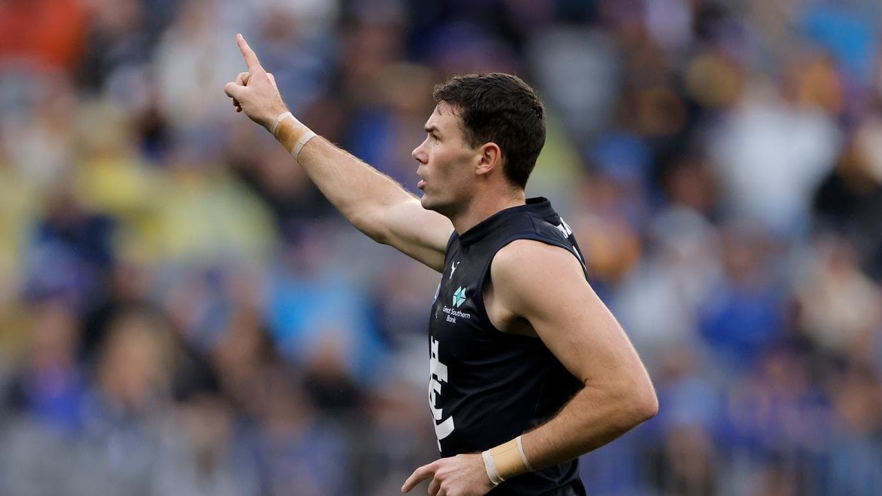 Voss behind McGovern, excited for Walsh's Blues return