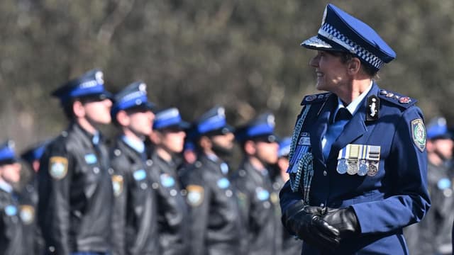 Successor search goes on as recruits farewell top cop