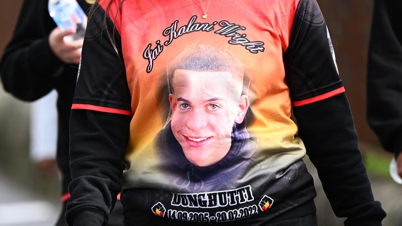 Family walks out as court vision shows teen hit cop car