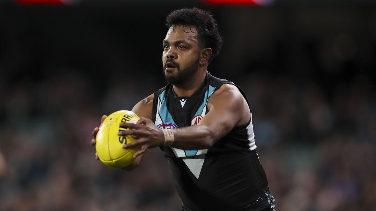 Port Adelaide forward quits as new coach swings axe
