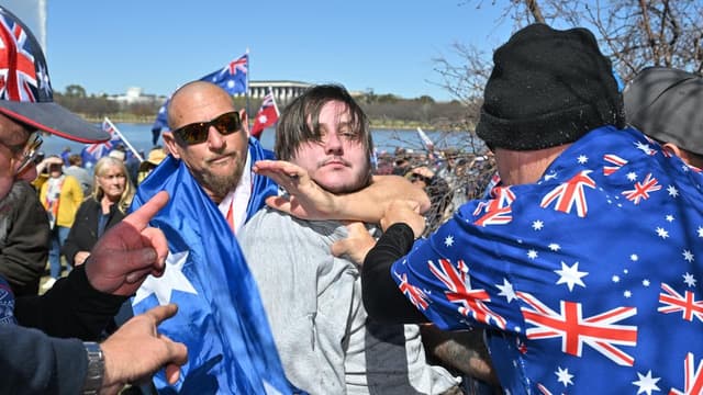 Brawls erupt as protesters clash at immigration rallies