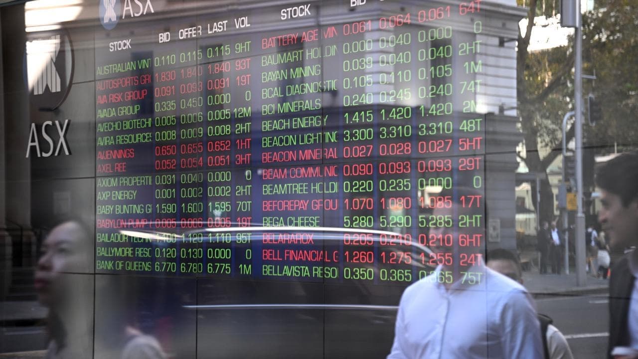 Australian shares dip while gold pushes even higher