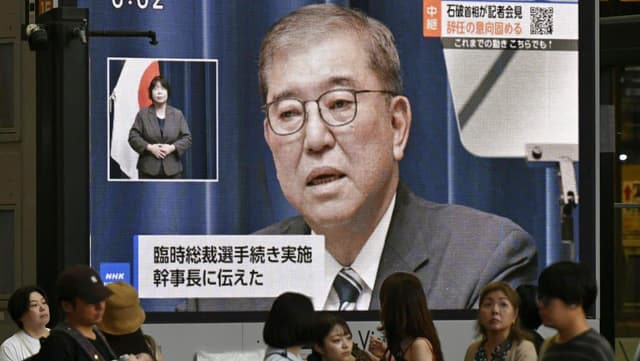 Japan's PM resigns after bruising election losses