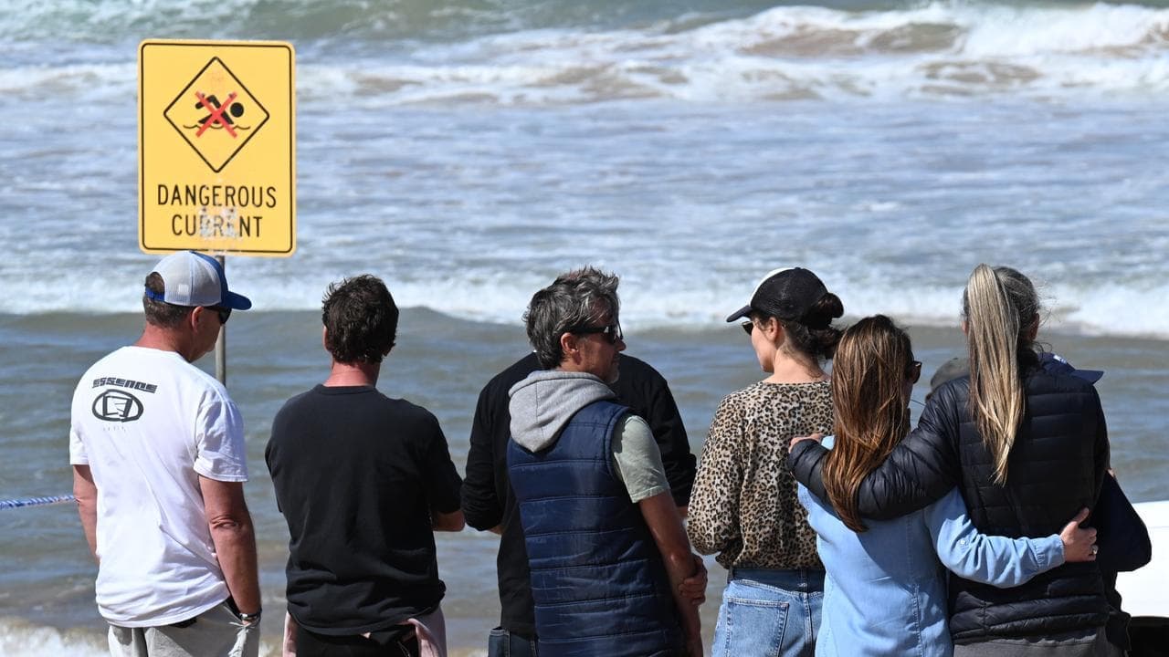 Twin of surfer killed by shark shares emotional tribute