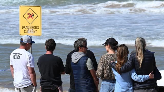 Twin of surfer killed by shark shares emotional tribute