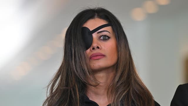 Protest charges dropped against woman 'punched by cop'