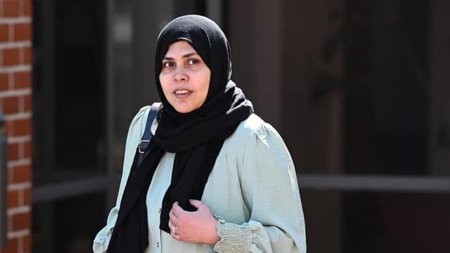 Woman denies trying to drown girls in river