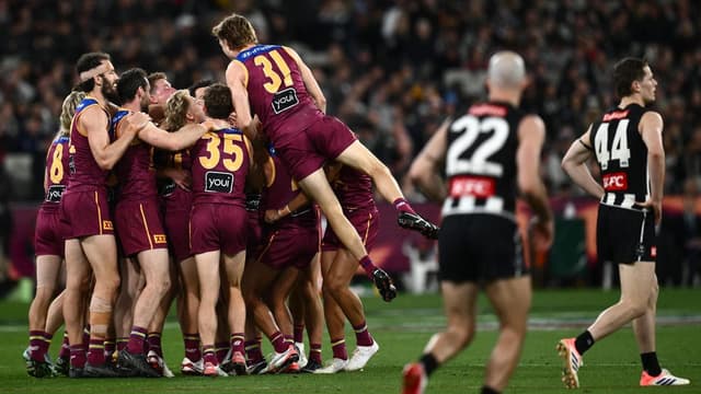 Lions beat Magpies, book grand final against Cats