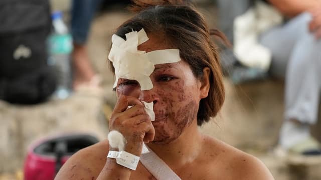 Philippines ends quake rescues, focuses on displaced