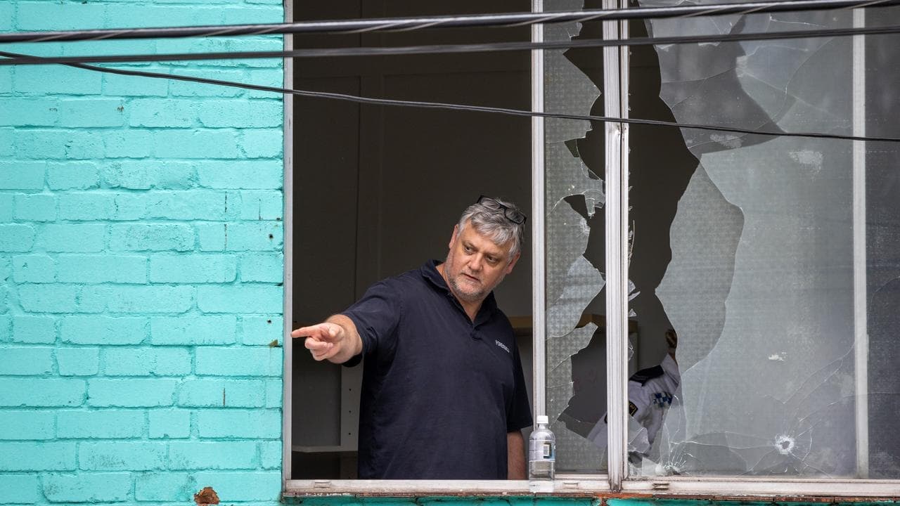 Bullet holes but no motive after street shooting spree