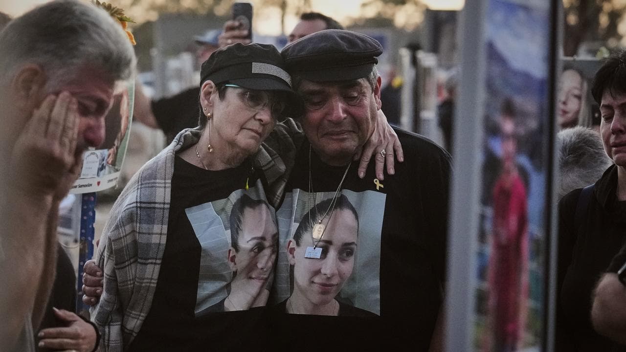 Israel marks attack anniversary as Gaza talks under way