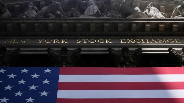 Wall Street retreats from record closing highs