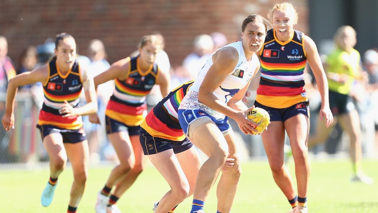 Kangaroos closer to history after Crows demolition job