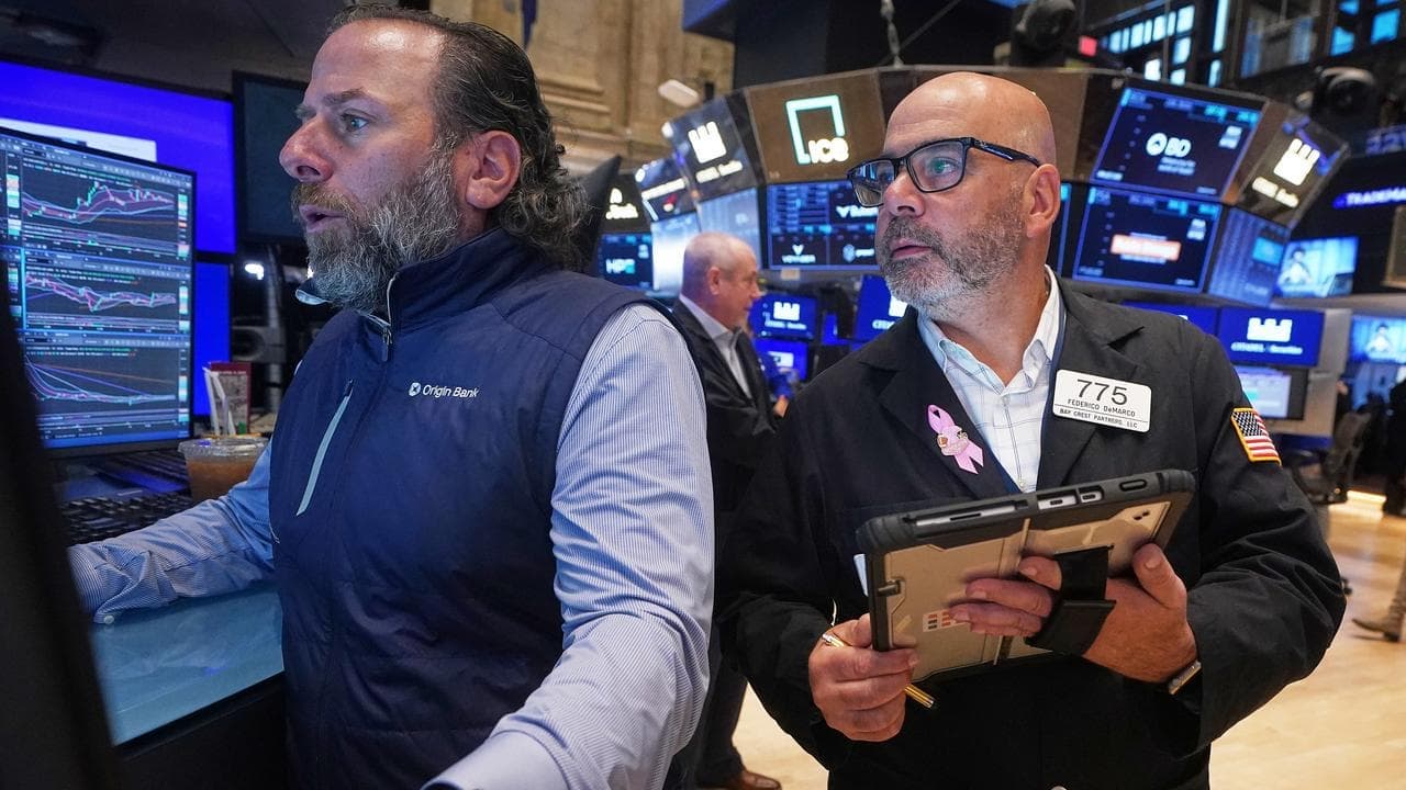 Wall Street ends sharply higher on upbeat earnings
