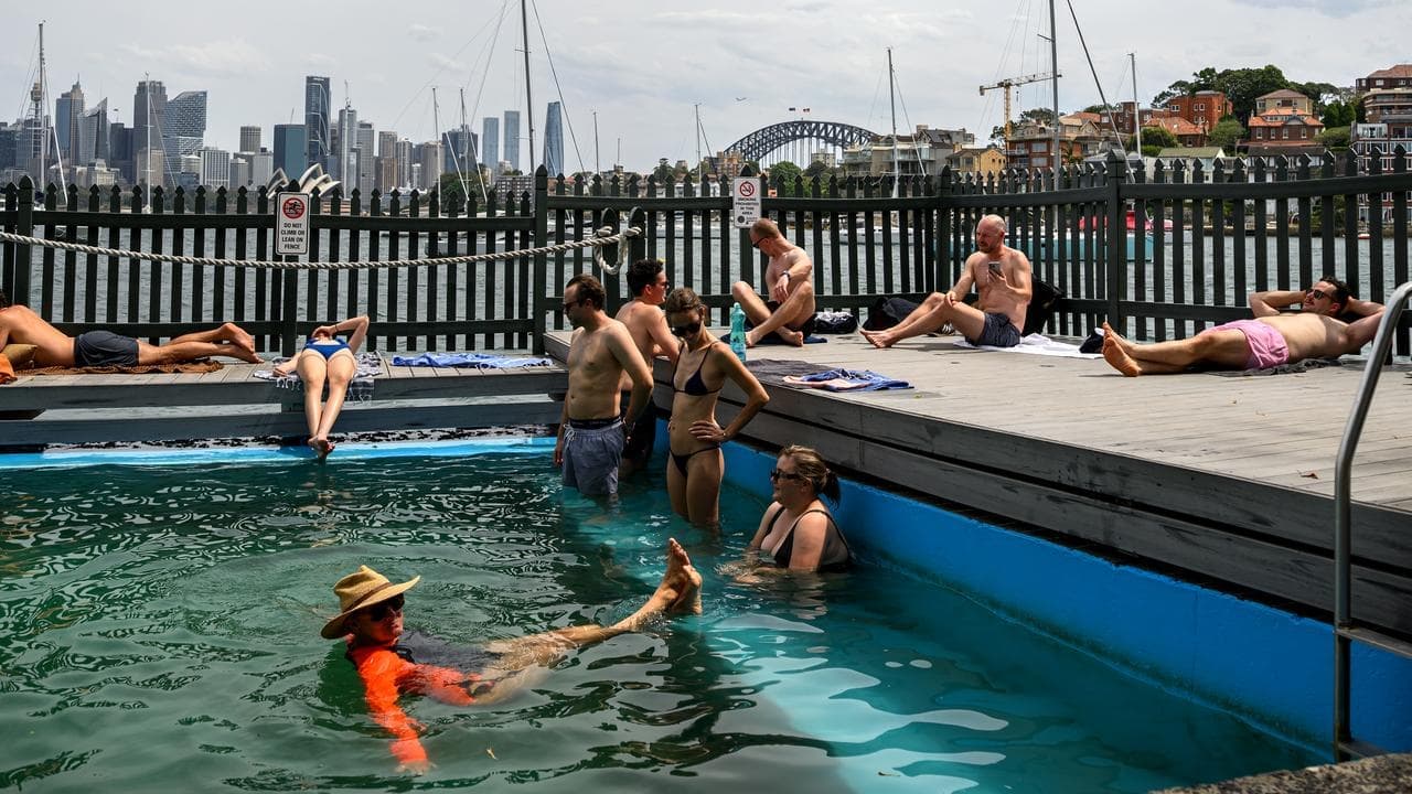 Snap heatwave breaks records as winds wreak havoc