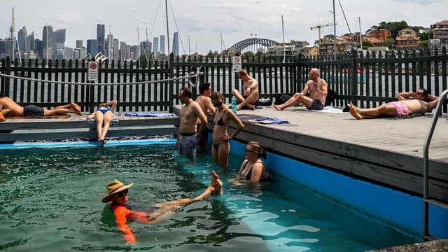 Snap heatwave breaks records as winds wreak havoc