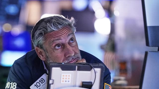 Wall St ends lower on revived US-China trade tensions