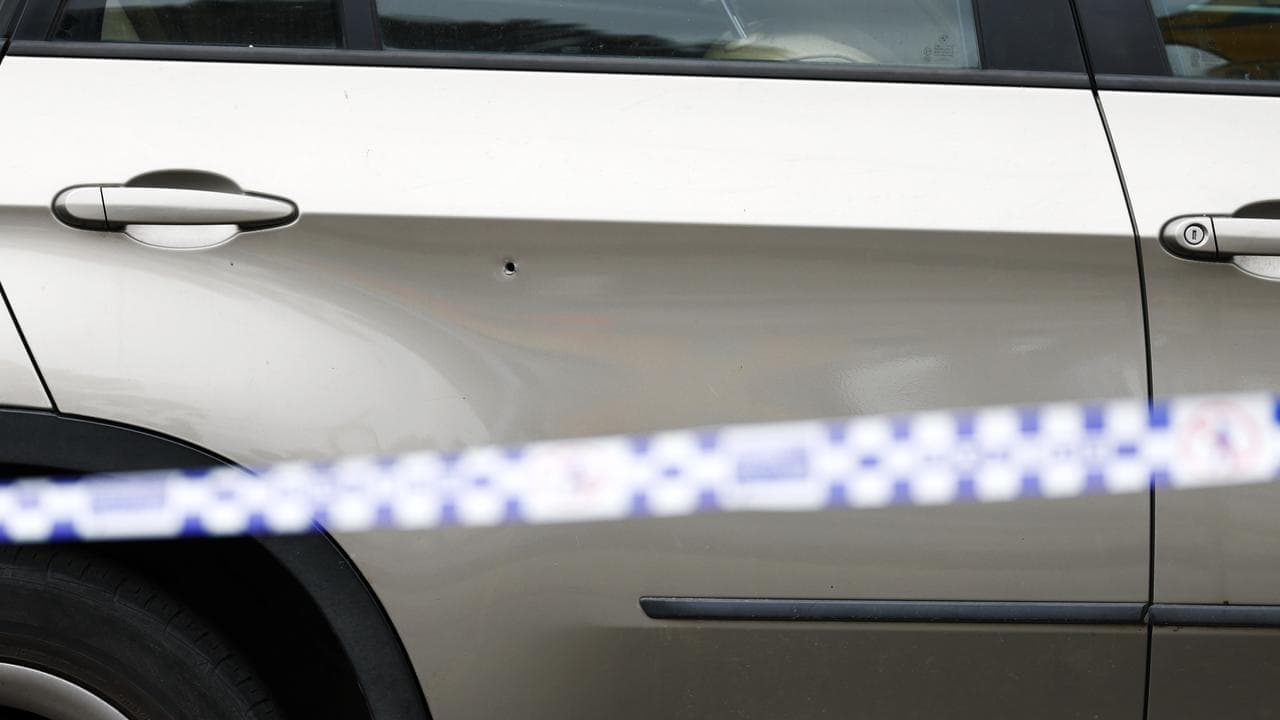 Car shot up outside long-targeted tobacco store