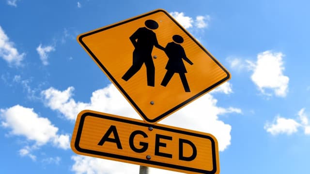 Aged care worker charged after 104-year-old robbed