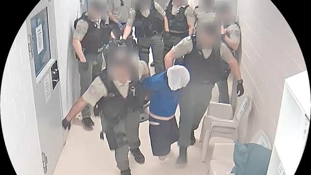 Inmate who had seizure roughly handled by prison guards