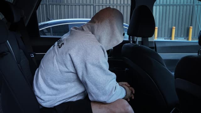 Two charged over role in underworld figure's murder