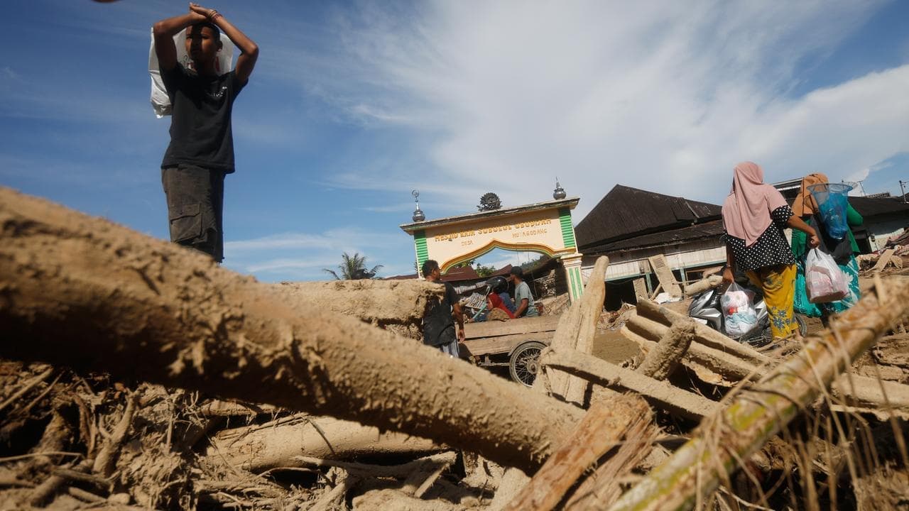 Asian floods toll surges past 1300, millions displaced