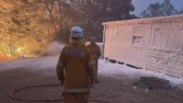Smoke signal to mainland as fire threatens coastal town