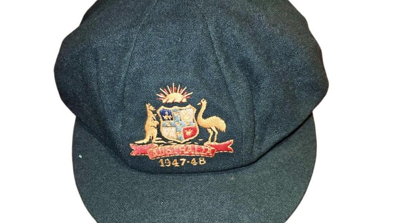 Bradman's baggy green goes under the hammer