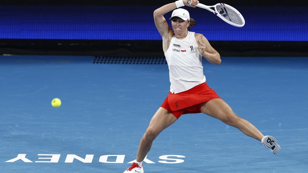Swiatek fights back as Poland beat Germany in Sydney