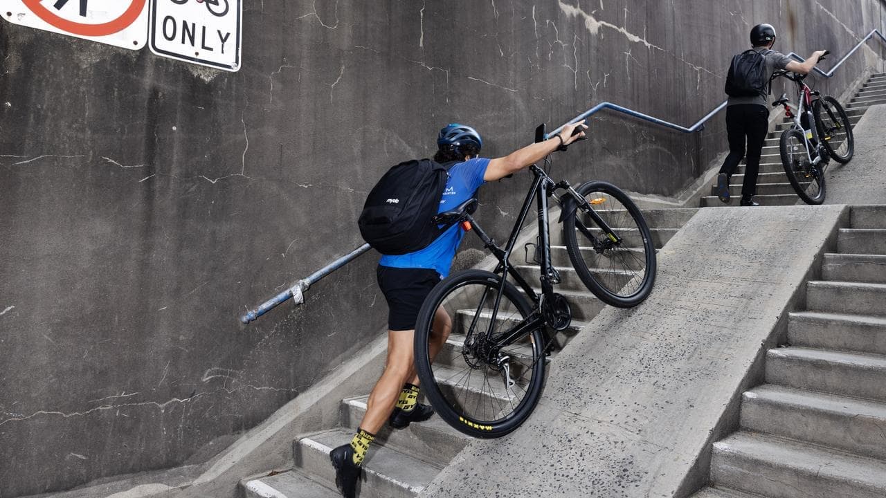 Stairs shown door as bike ramp opens on famous bridge