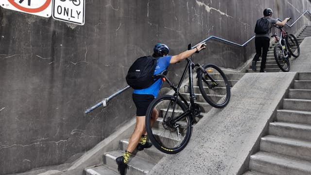 Stairs shown door as bike ramp opens on famous bridge