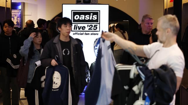 Oasis tour tunes up economy but clouds rate cut hopes