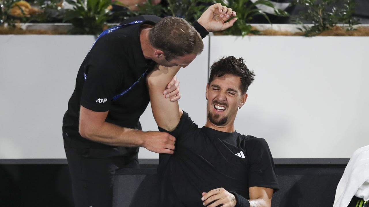 Kokkinakis injury flares, but wins singles comeback