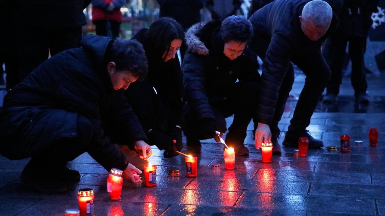 Swiss court keeps bar owner in custody over deadly fire