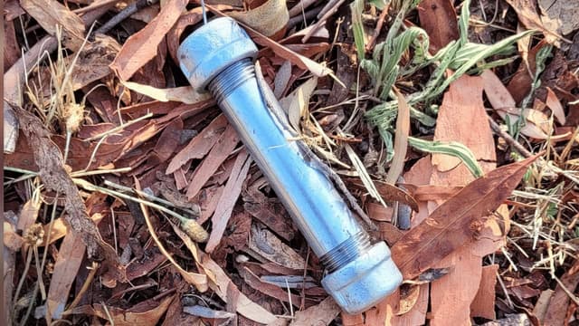 Pipe bombs found on suburban footpaths, in parks