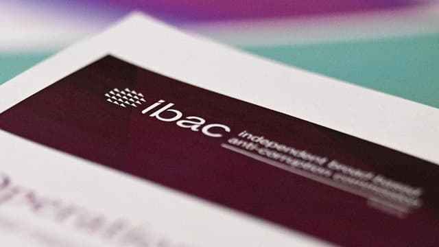 Cop charged after admitting to cash from debt collector