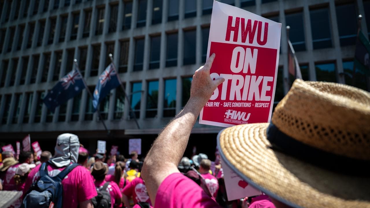 Enraged health workers bring strike to premier's door