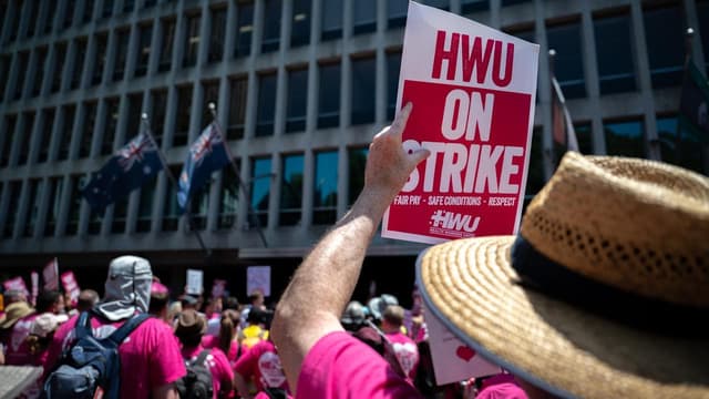 Enraged health workers bring strike to premier's door