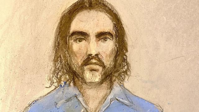 Brand appears in court by video link on further charges