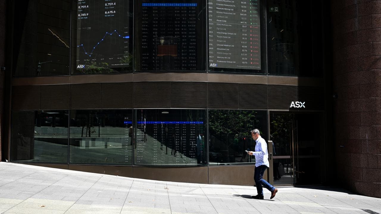 Aussie shares end rocky week slightly lower, gold soars